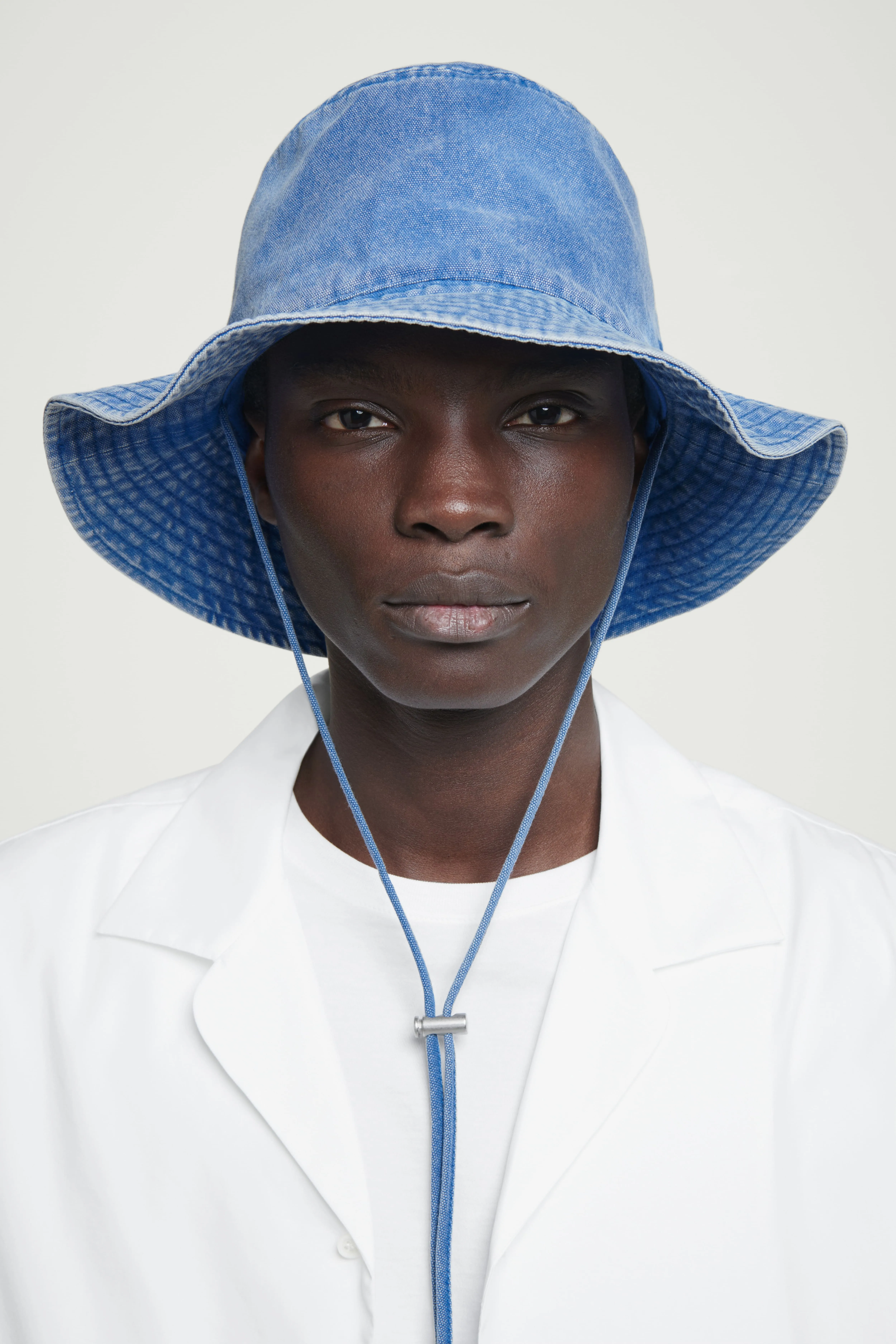 DRAWSTRING COTTON HAT - BLUE - Men | H&M GB