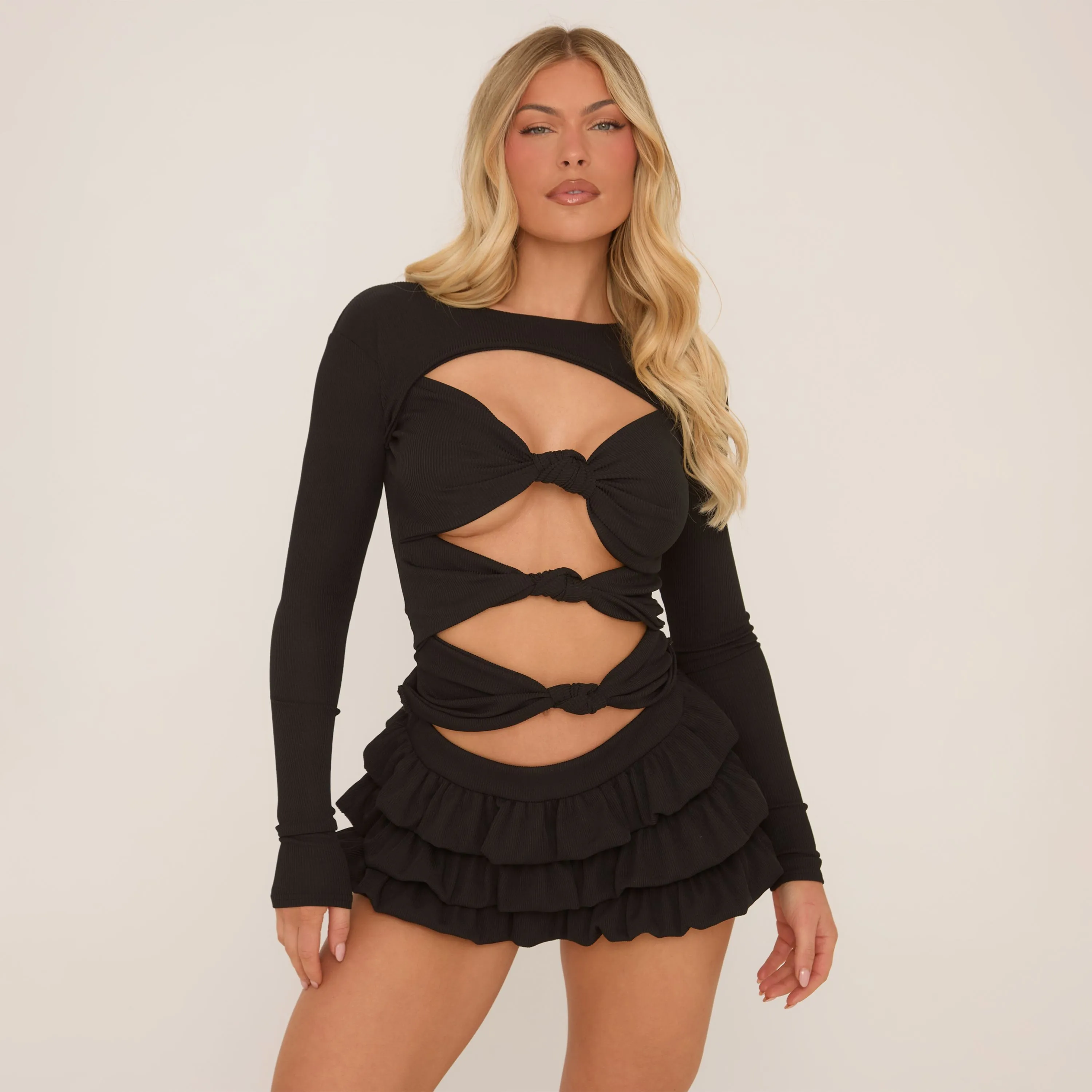 Long Sleeve Cut Out Knot Detail Top And Low Rise Micro Mini Skirt Co-Ord Set In Black