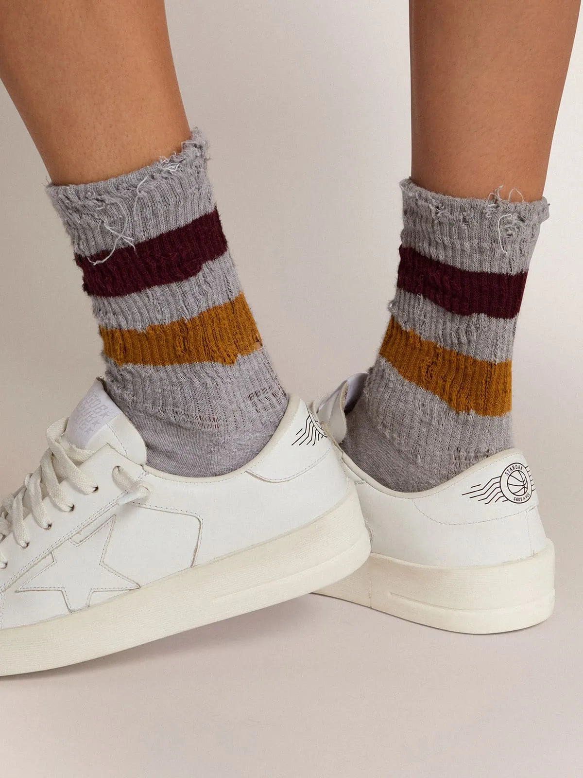 Melange grey socks with distressed details and two-tone stripes